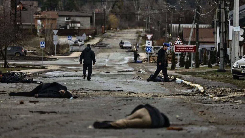 Bodies of slain civilians on Yablunska Street in Bucha after Russian forces withdrew, early April 2022.